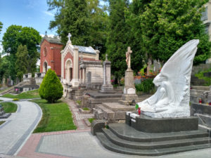 Front-facing graves. Piano-keys styled monument in the foreground - Igor Bilozir